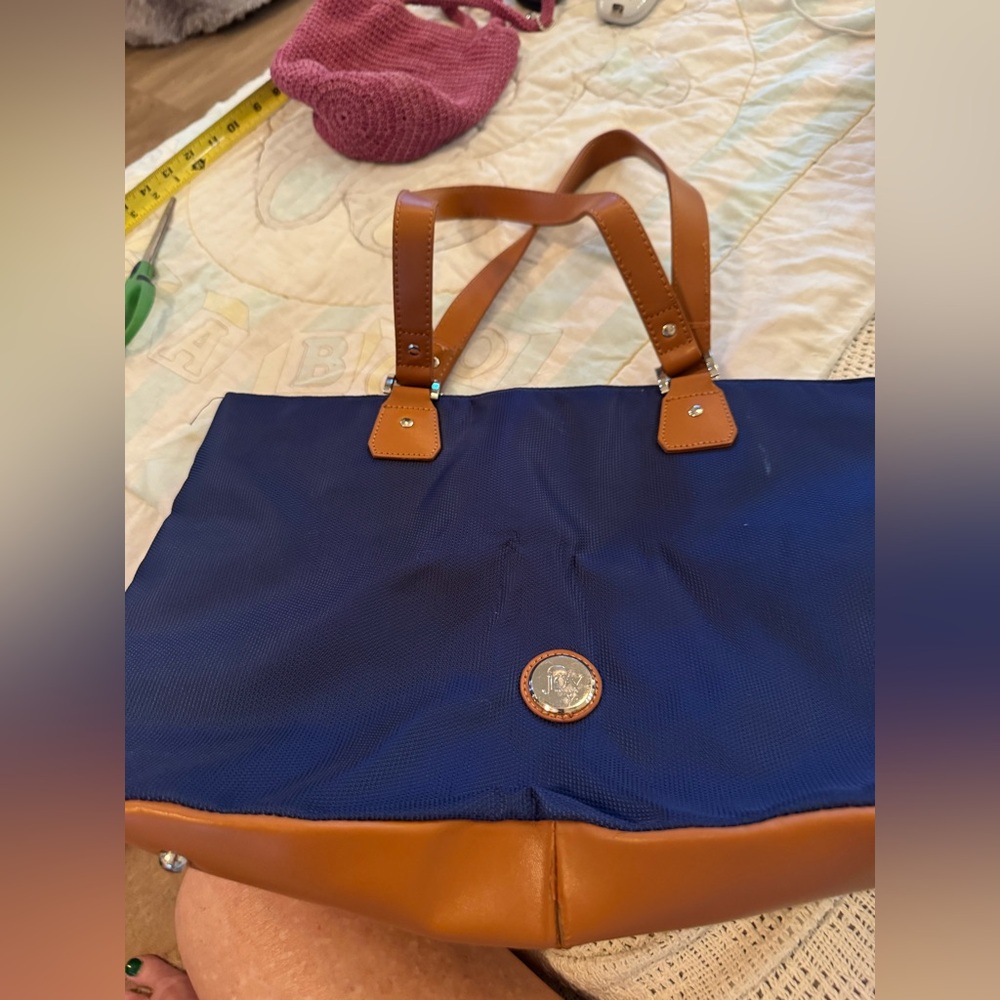 Joy brand Navy and Tan Tote Bag the bottom where it meets the material is worn!